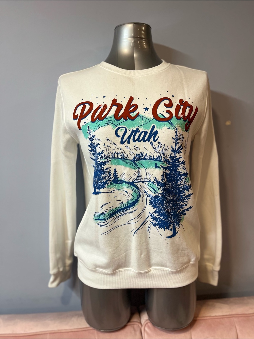 Love Tribe Cream Crewneck with Park City Graphic and Teal & Blue Landscape